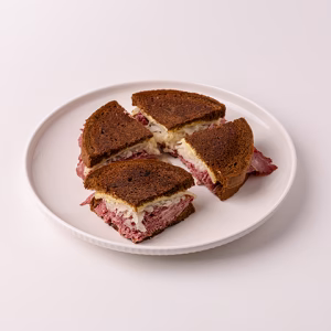 Thin slices of well-marbled corned beef, sauerkraut and Jarlsberg cheese on pumpernickel with our mustard sauce.