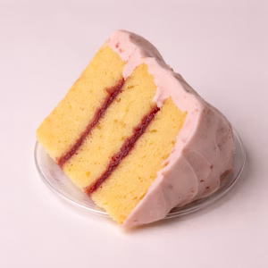 Yellow cake with strawberry filling and buttercream frosting.
